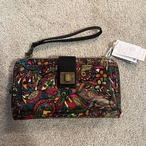 Sakroots cross body wallet.